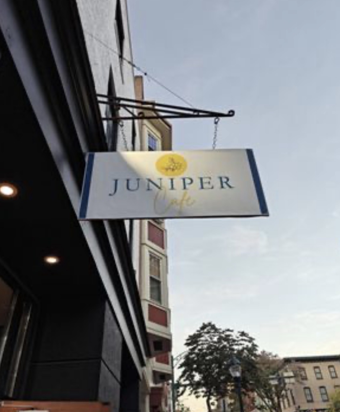 Juniper Cafe hanging sign